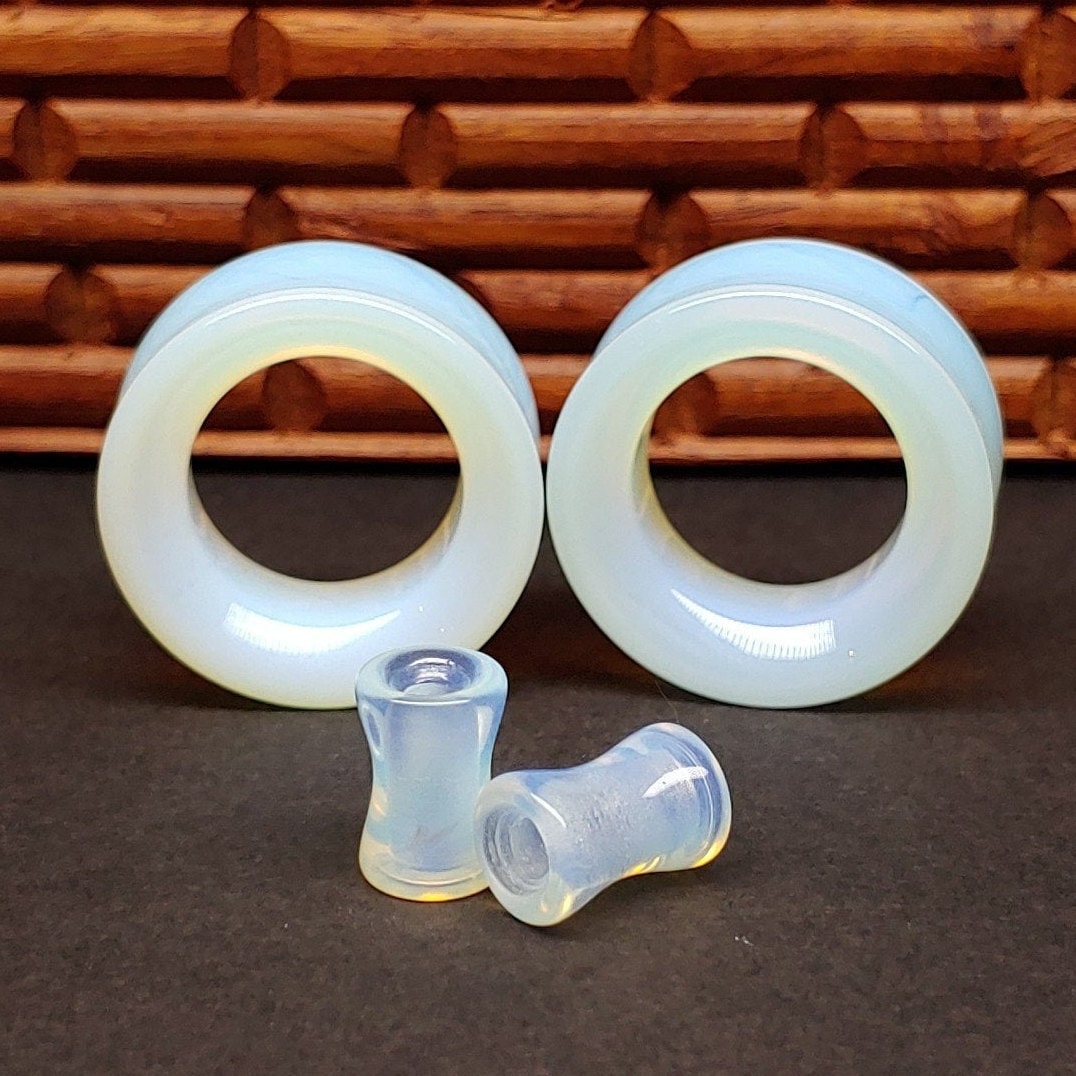 Opalite glass tunnels for stretched ears.