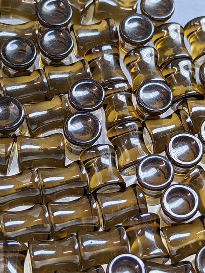 Concave Brown Glass Plugs