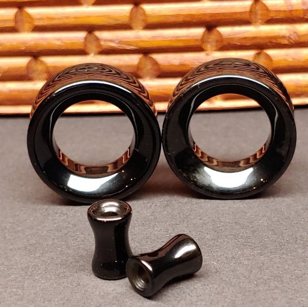 Black agate tunnels for stretched ears.