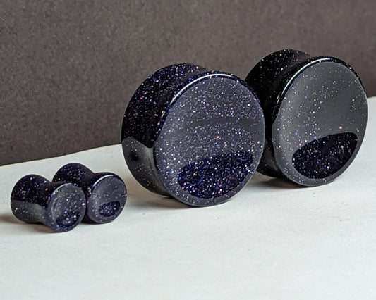 Concave Blue Goldstone Glass Plugs for stretched ears.
