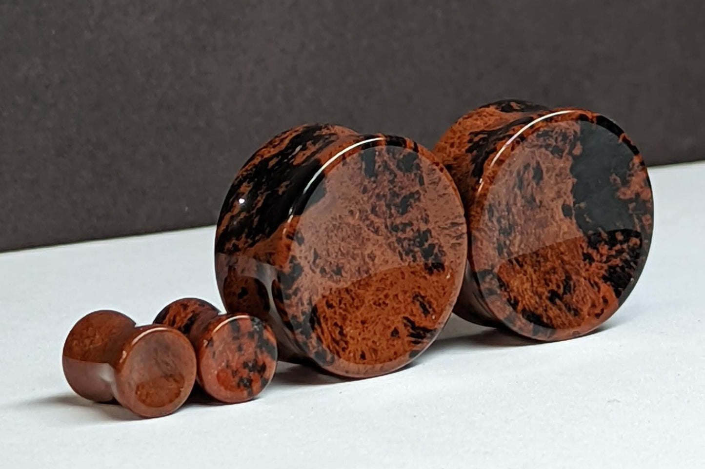 Concave Mahogany Obsidian Stone Plugs for stretched ears