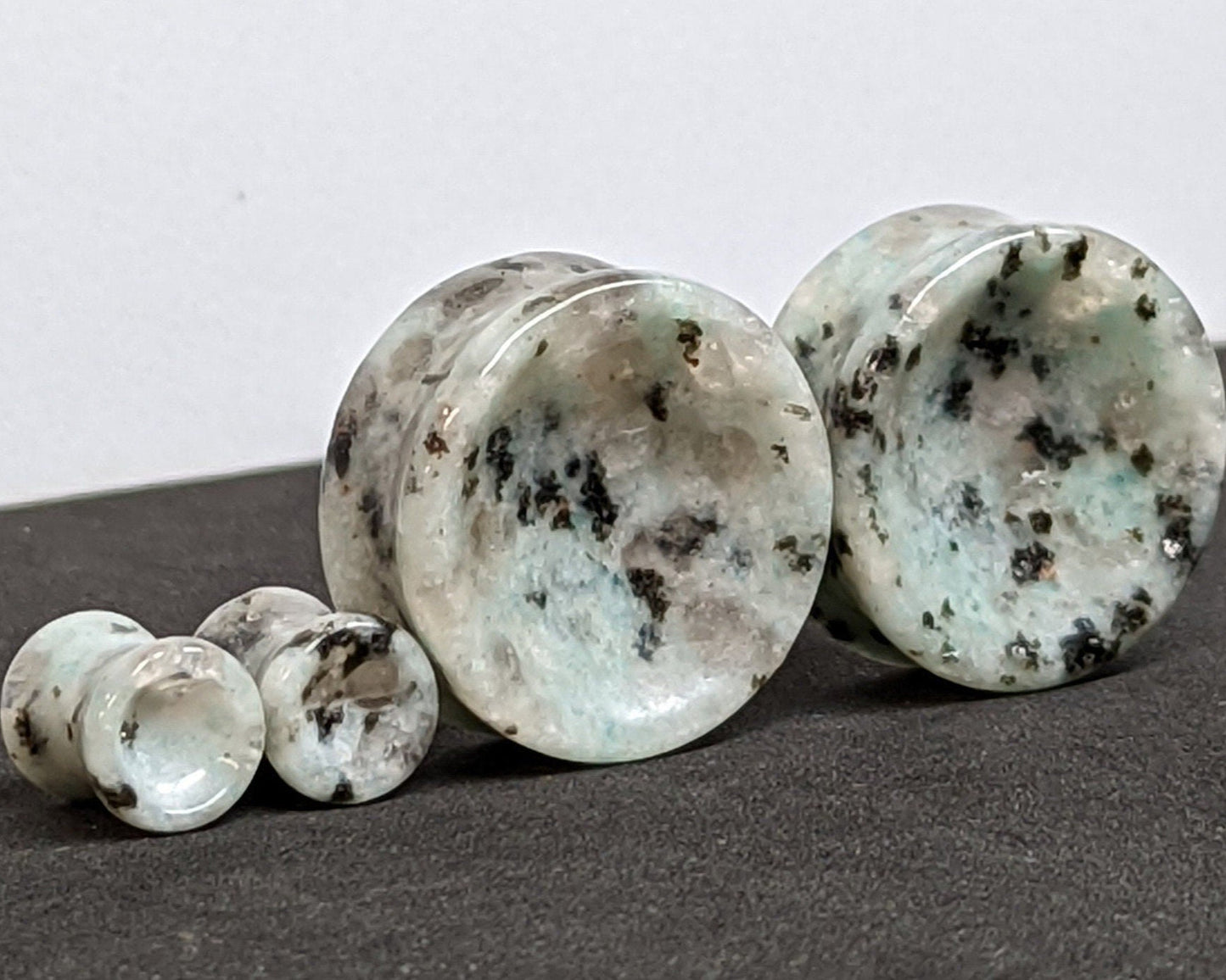 Concave Sesame Quartz Stone plugs for stretched ears. 