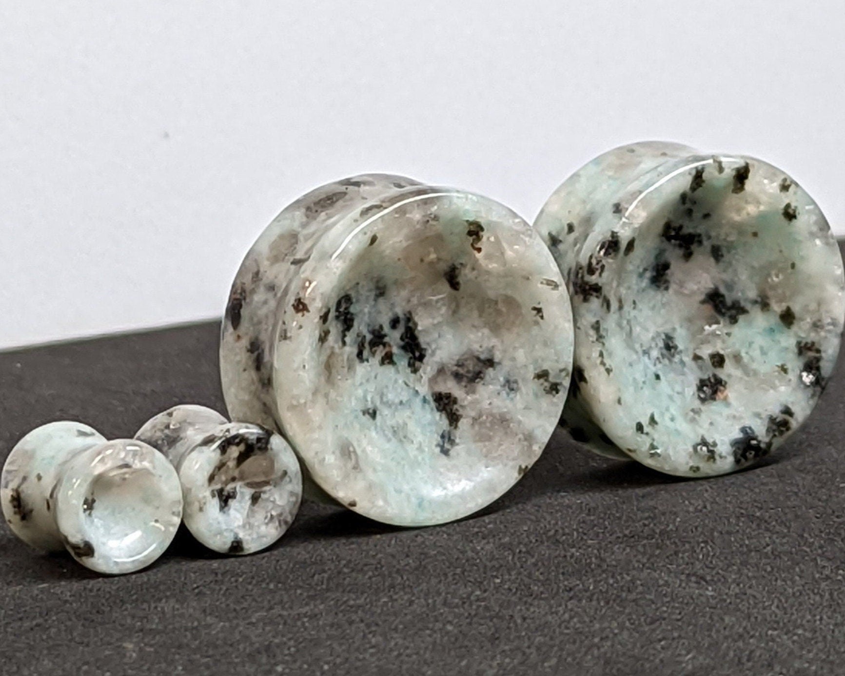 Concave Sesame Quartz Stone plugs for stretched ears. 