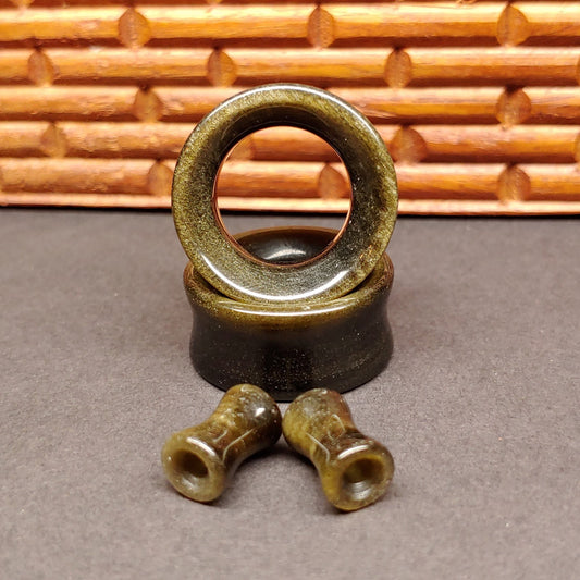 Golden Obsidian Tunnels for stretched ears. 