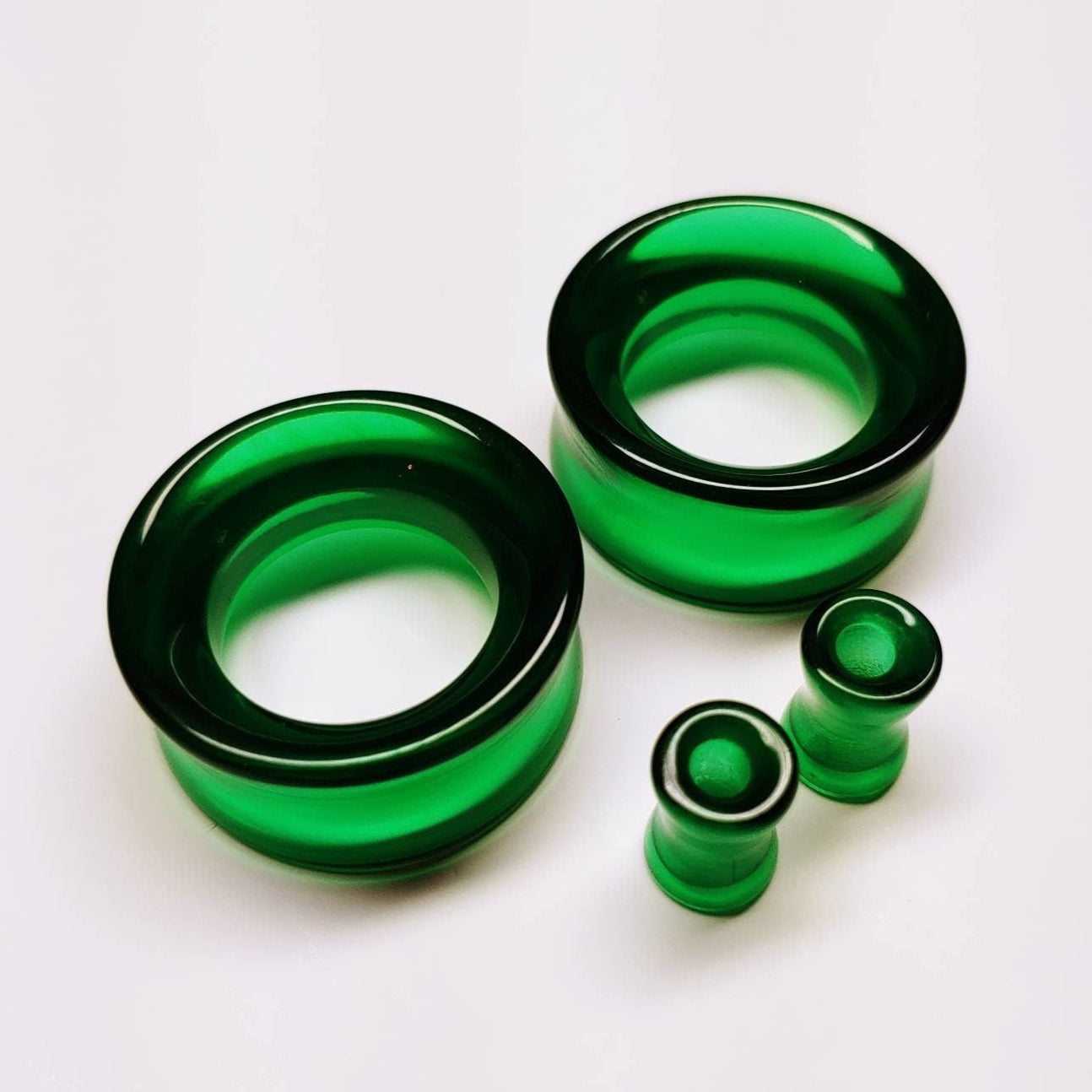 Green Glass Tunnels for stretched ears.
