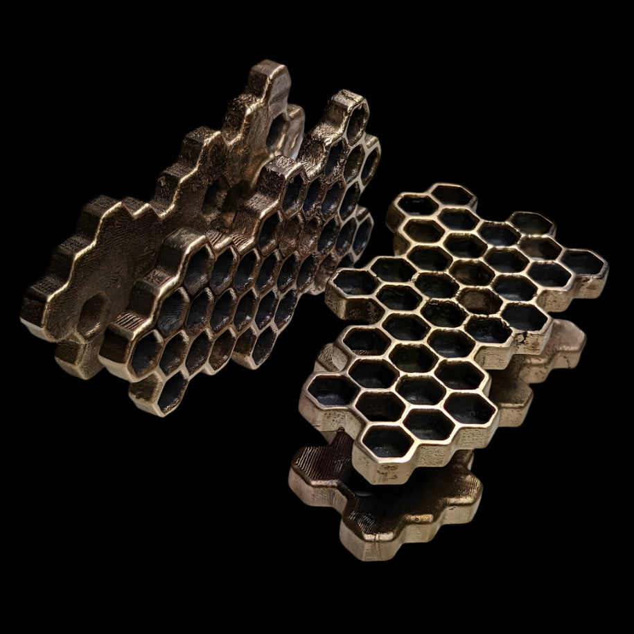 Ear weights for stretched ears that look like honeycombs. 