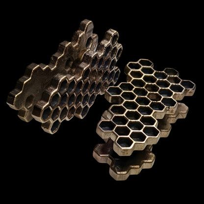Ear weights for stretched ears that look like honeycombs. 
