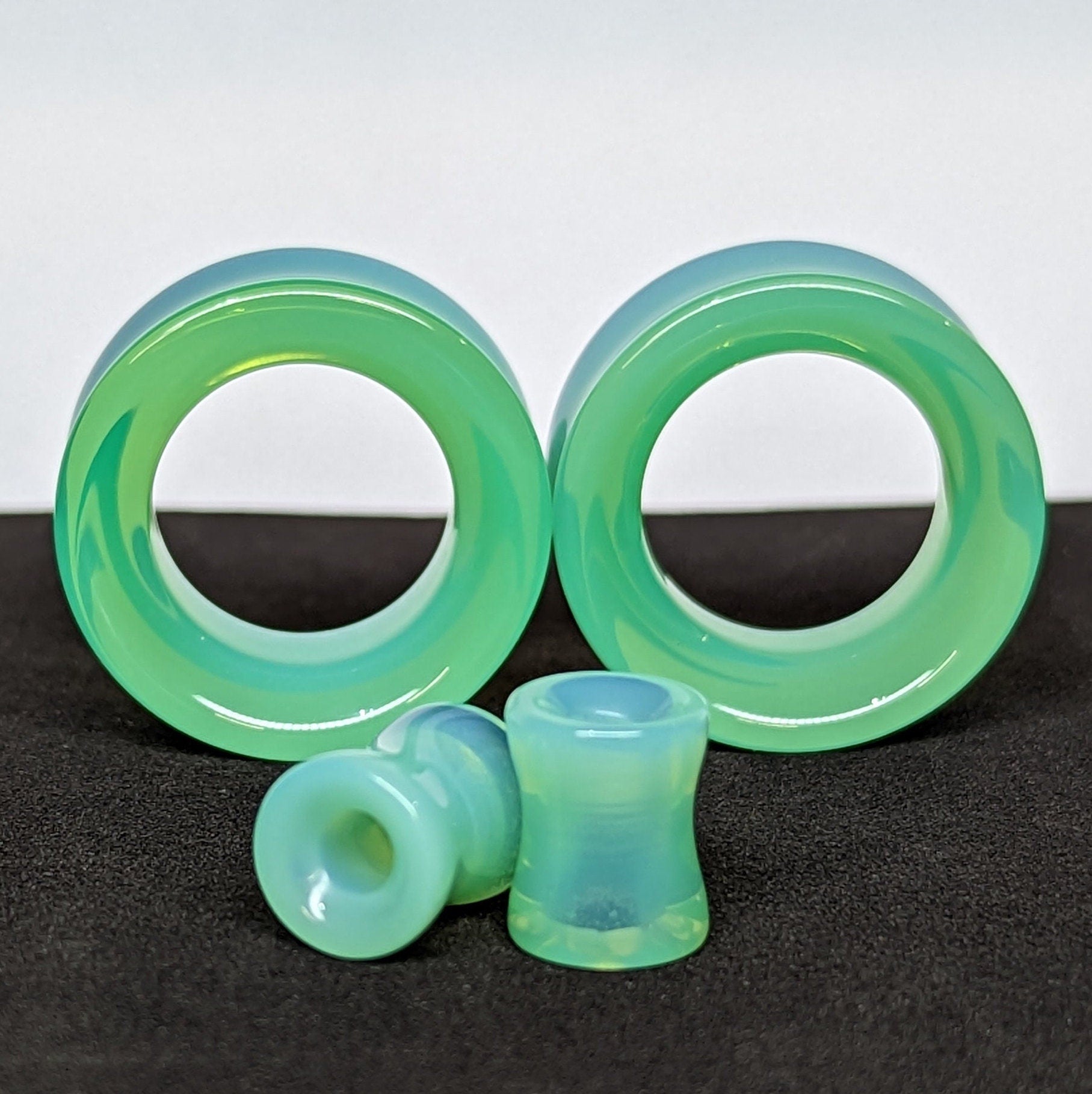Light Green glass tunnels for stretched ears. 