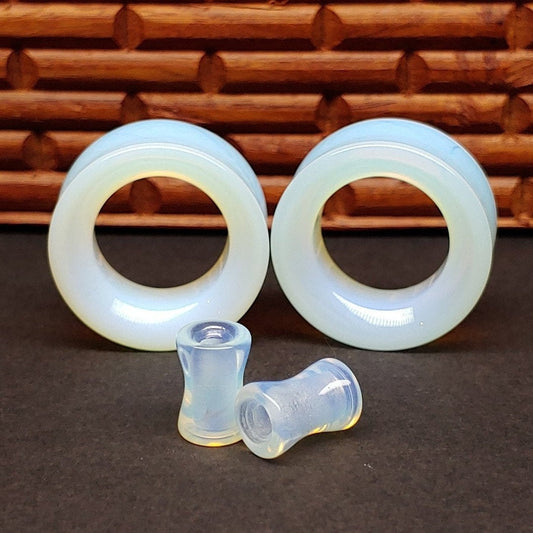 Opalite glass tunnels for stretched ears.