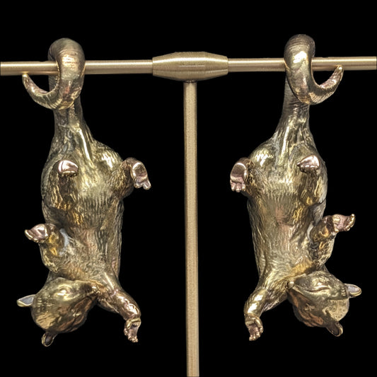Brass Ear weights that look like opossums hanging from your ears by their tails