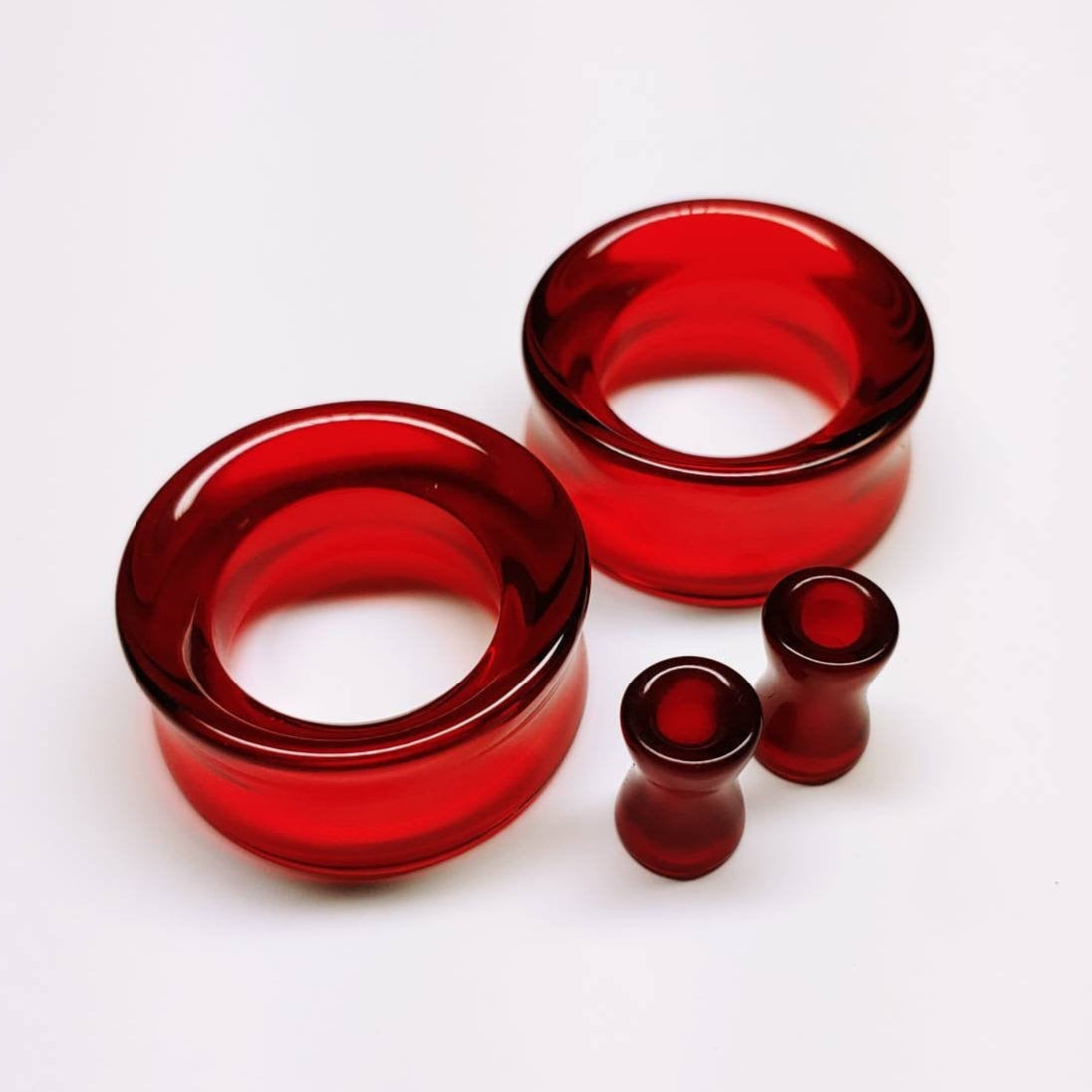 Red Glass Tunnels for stretched ears. 