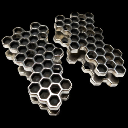 Honeycomb ear weights for stretched ears that look like honeycombs. 